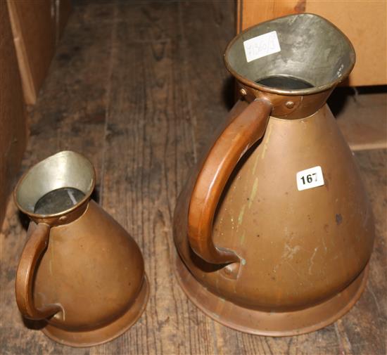 Two copper flagons